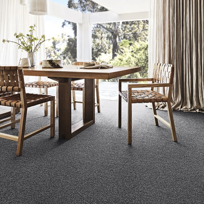 Dining room with dark blue wool Carpet flooring